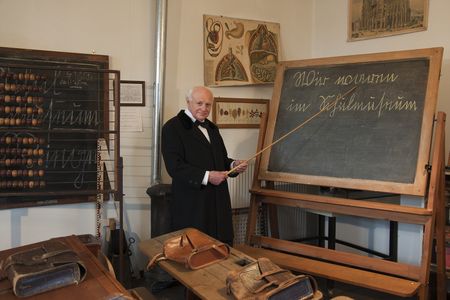 Museum van de dorpsschool in Riege - Leraar aan het schoolbord